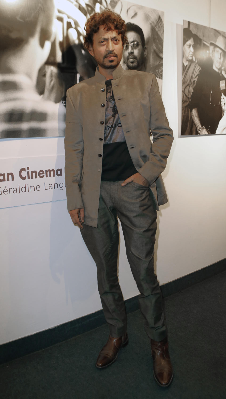 Actor Irrfan Khan poses for photographers as he arrives for Extravagant India!, the international Indian Film Festival in Paris, Tuesday Oct. 15, 2013. (AP Photo/Jacques Brinon)