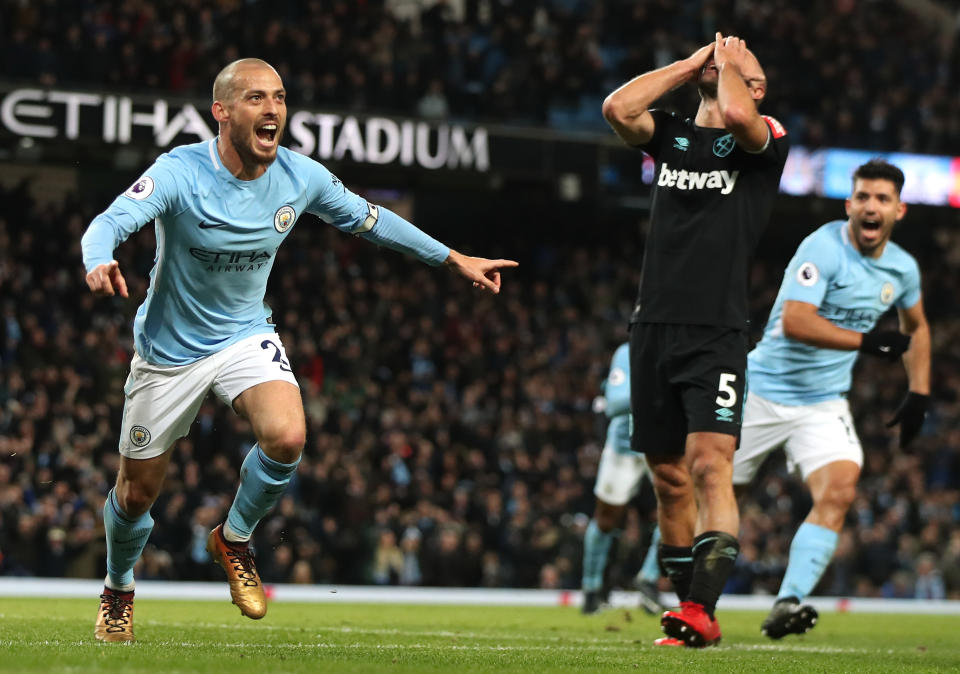 David Silva celebrates his winner for Manchester City. (Getty)