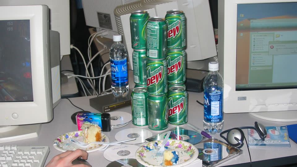 Most of the players in "LAN Party" are groups of white men, with only a few women and people of color featured. Cartons of Mountain Dew and Bawls, energy drinks that have come to be culturally associated with gamers, are a recurring theme — so much so that Mountain Dew released a line of products called “Game Fuel” in 2007. - S. Tordoff/Courtesy Thames & Hudson