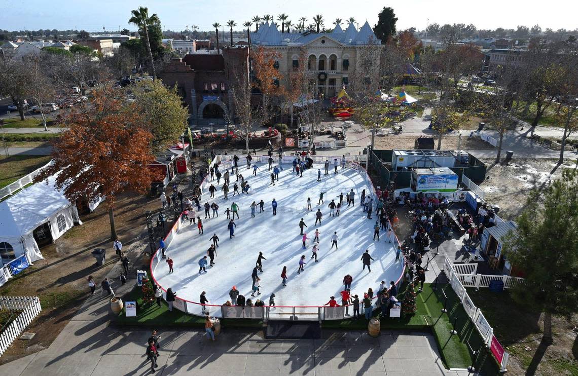 Hanford’s Winter Wonderland, in its second year, features an ice rink in Civic Center Park. The festivities run every day through January 8. Photographed from the roof of the Hanford Civic Auditorium Wednesday, Dec. 28, 2022 in Hanford.