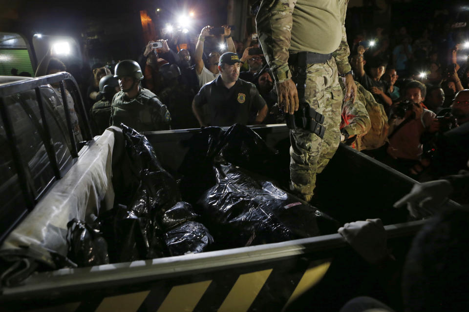 Recovered human remains are seen in a police vehicle after being found during a search for Indigenous expert Bruno Pereira of Brazil and freelance reporter Dom Phillips of Britain, in Atalaia do Norte, Amazonas state, Brazil, Wednesday, June 15, 2022. A federal police investigator said a suspect confessed to fatally shooting Pereira and Phillips in a remote part of the Amazon and took officers to where the bodies were buried. (AP Photo/Edmar Barros)