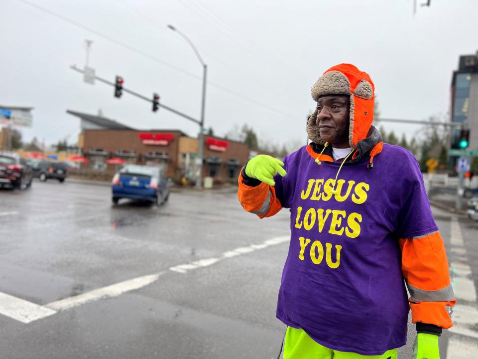 Tyrone Spates, recognizable in Salem for his street ministry, greets passersby on Jan. 18 at the intersection of Commercial Street and Vista Avenue SE.