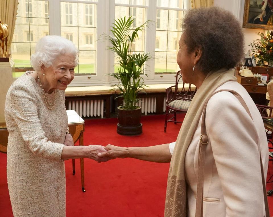 Queen Elizabeth II presents the Queen’s Gold Medal for Poetry to Grace Nichols during a private audience at Windsor Castle. (PA)