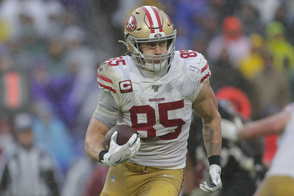 San Francisco 49ers tight end George Kittle (85) runs with ball against the Baltimore Ravens in the second half of an NFL football game, Sunday, Dec. 1, 2019, in Baltimore, Md. (AP Photo/Julio Cortez)