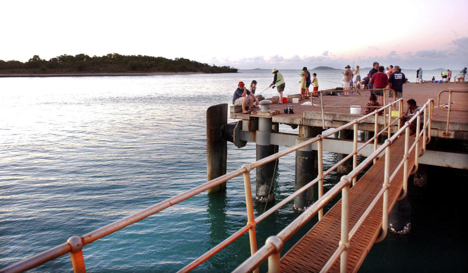 Fishermen try their luck at the Seisia jetty at the top of Cape York Peninsula.