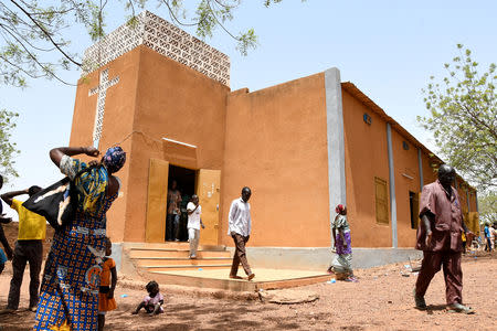 Protestants, who some of them fled Dablo and its surroundings, are seen leaving a church in the city of Kaya, Burkina Faso May 16, 2019.REUTERS/Anne Mimault