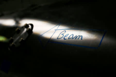 The direction of the beam is marked on the new linear accelerator Linac 4, the newest accelerator acquisition since the Large Hadron Collider (LHC), which is due to feed the CERN accelerator complex with particle beams of higher energy, during its inauguration at the European Organization for Nuclear Research (CERN) in Meyrin near Geneva, Switzerland, May 9, 2017. REUTERS/Denis Balibouse