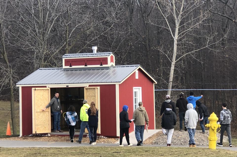 The new maple sugarhouse at Marcus Whitman is put to good use, boiling sap produced by maple trees in the woods behind it.