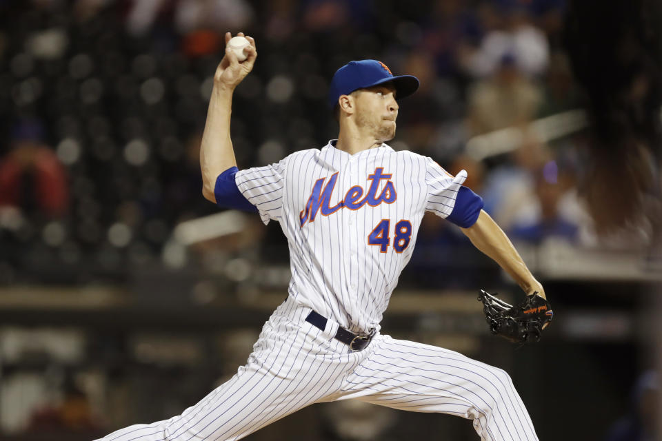 New York Mets starting pitcher Jacob deGrom winds up during the first inning of the team's baseball game against the Miami Marlins, Wednesday, Sept. 25, 2019, in New York. (AP Photo/Kathy Willens)