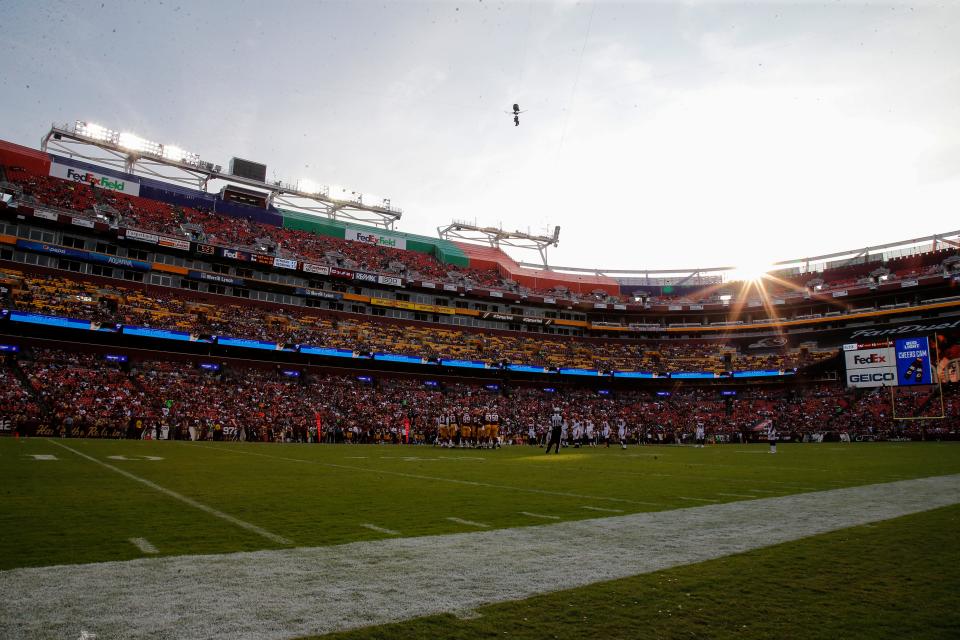 The sun begins to set in the third quarter during the Week 3 NFL preseason game between the Cincinnati Bengals and Washington, Sunday, Aug. 27, 2017, at FedEx Field in Landover, Maryland. 