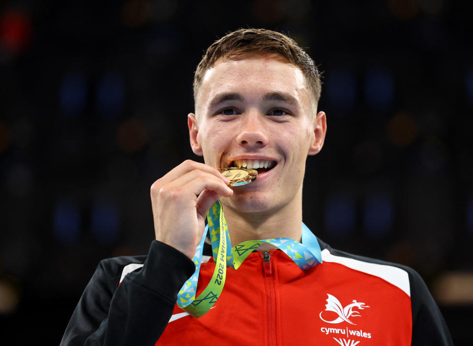 Commonwealth Games - Boxing Men’s Over 63.5kg-67kg (Welterweight) - Medal Ceremony - LocationThe NEC Hall 4, Birmingham, Britain - August 7, 2022 Gold medallist Wales' Ioan Croft celebrates on the podium REUTERS/Hannah Mckay