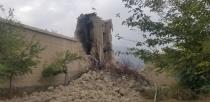 View of ruins of destroyed ancestral home of Nangarhar provincial official Ajmal Omar in Kodi Khel