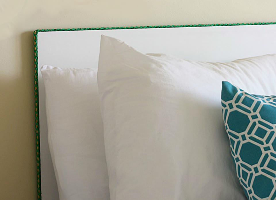 <body> <p>Sometimes the littlest details can make the largest style statement, as this surprisingly simple headboard proves. A piece of melamine <a rel="nofollow noopener" href=" http://www.bobvila.com/slideshow/10-insanely-creative-shelves-you-can-diy-47995?bv=yahoo" target="_blank" data-ylk="slk:shelving;elm:context_link;itc:0;sec:content-canvas" class="link ">shelving</a>, some fabric trim, and a few packs of brass thumbtacks come together to create this streamlined finished product that adds the just-right amount of visual interest to a colorful guest room. </p> <p><strong>Related: <a rel="nofollow noopener" href=" http://www.bobvila.com/slideshow/15-lazy-ways-to-make-a-big-change-in-your-home-49443?bv=yahoo" target="_blank" data-ylk="slk:15 Lazy Ways to Make a Big Change in Your Home;elm:context_link;itc:0;sec:content-canvas" class="link ">15 Lazy Ways to Make a Big Change in Your Home</a> </strong> </p> </body>