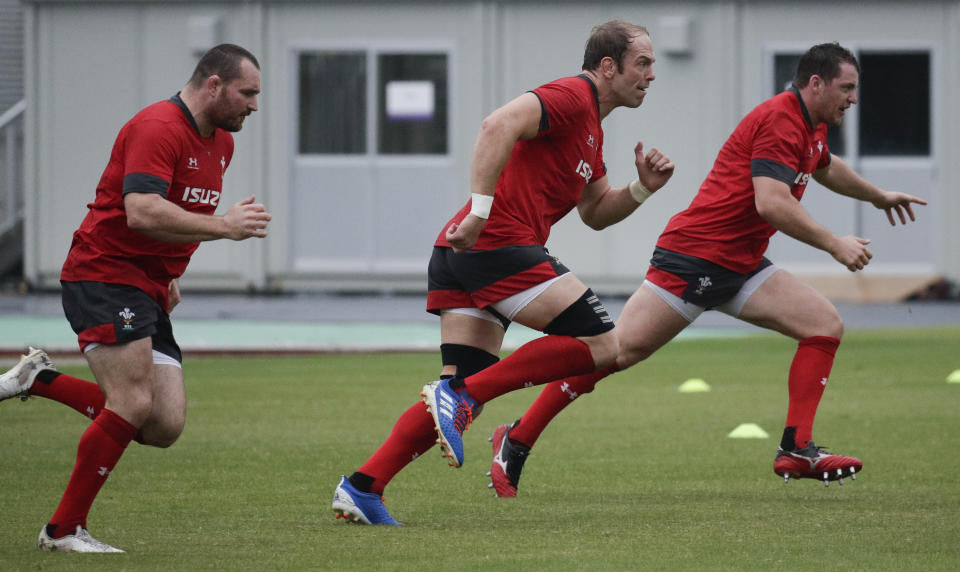 Wales rugby team captain Alun Wyn Jones, center, trains at Beppu, Japan, Friday Oct. 18, 2019. Wales will face France in the quarterfinals at the Rugby World Cup on Oct. 20. (AP Photo/Aaron Favila)