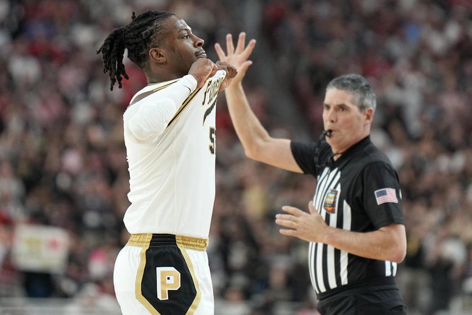 Purdue guard Lance Jones (55) celebrates a basket against NC State during the second half of the NCAA college basketball game at the Final Four, Saturday, April 6, 2024, in Glendale, Ariz. (AP Photo/Brynn Anderson )