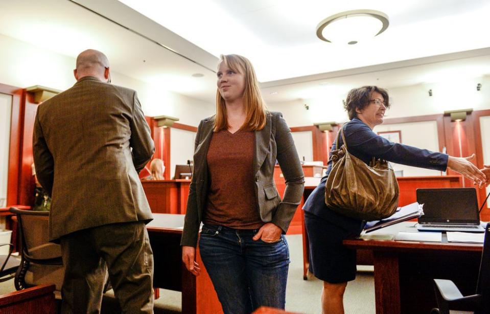 Tilli Buchanan smiles as she leaves Judge Kara Pettit's Third District Courtroom, Tuesday, Nov. 19, 2019, in Salt Lake City