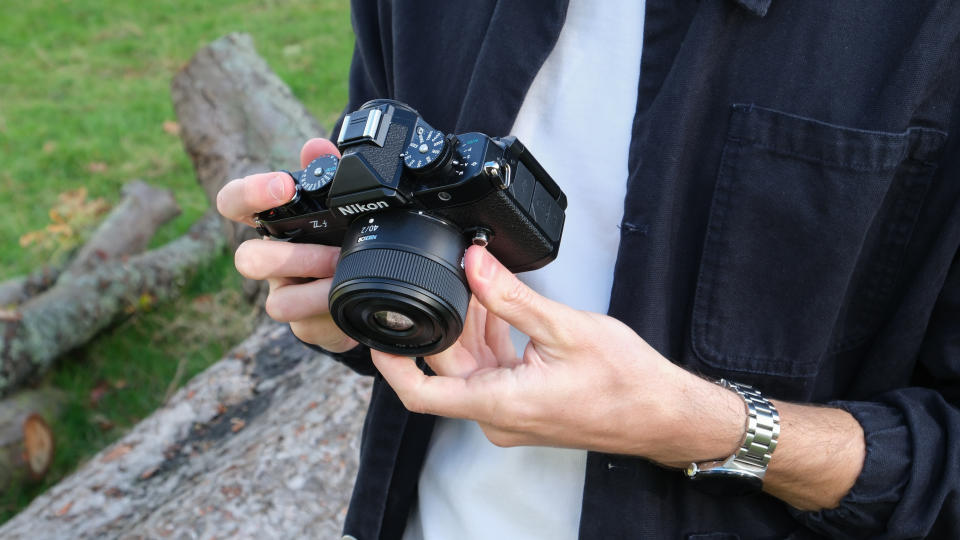 Nikon Zf camera held in hands