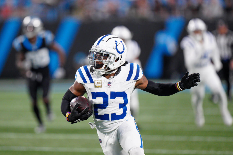 Indianapolis Colts cornerback Kenny Moore II runs for a touchdown after an interception against the Carolina Panthers during the first half of an NFL football game Sunday, Nov. 5, 2023, in Charlotte, N.C. (AP Photo/Jacob Kupferman)