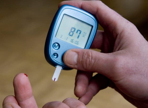 Researchers are investigating whether COVID-19 may cause diabetes in some people who contract the disease, but they say more studies are needed.  (Joerg Sarbach/Associated Press - image credit)