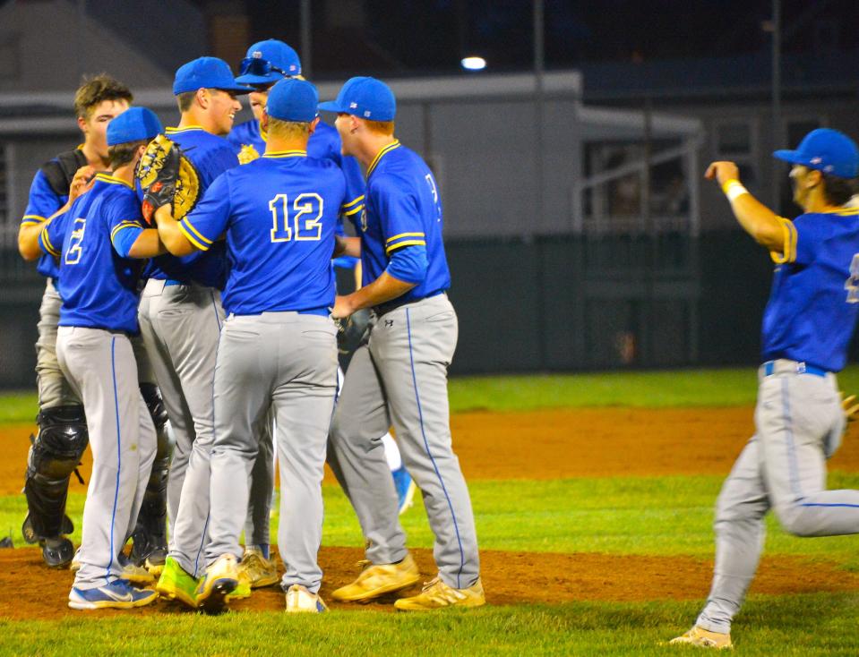 Clear Spring teammates surround pitcher Huston Trobaugh, third from left, after he finished his 1-0 complete-game victory over Allegany in the Class 1A semifinals at McCurdy Field in Frederick, Md. Trobaugh fired a two-hitter with 16 strikeouts to take out the Campers and move the Blazers into their first state final appearance since 2010.