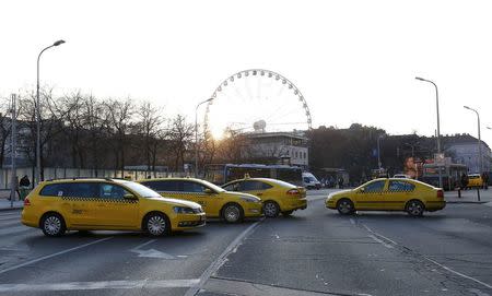 Taxis block a main road in Budapest's city centre, Hungary, January 18, 2016. REUTERS/Laszlo Balogh