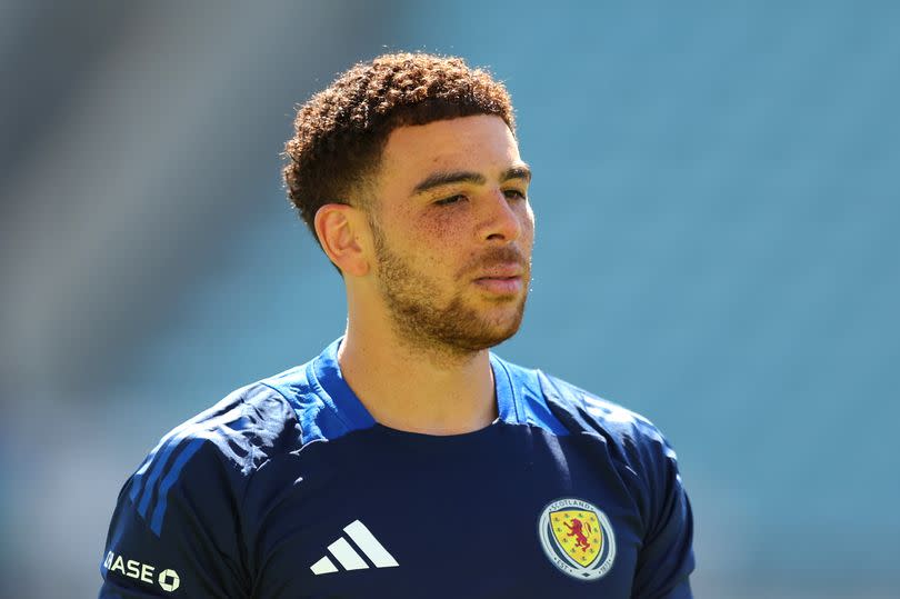 Che Adams of Scotland looks on during the warm up prior to the international friendly match between Gibraltar and Scotland