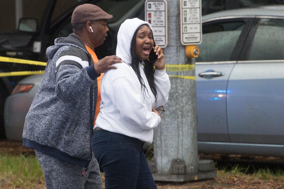 Parents picked up students behind a police barricade set up around Savannah High School's perimeter Wednesday morning after a hoax 911 call reported a shooting.