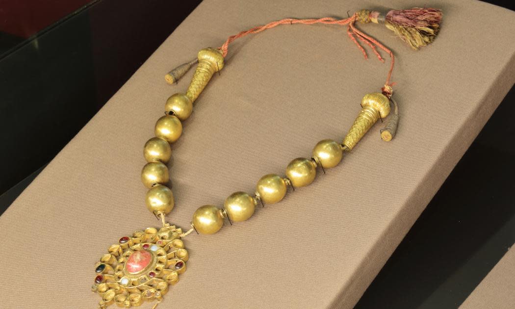 <span>The museum’s gilded copper and glass necklace is believed to have belonged to a Congolese chief hanged by Belgium’s colonial administration.</span><span>Photograph: PR Handout</span>