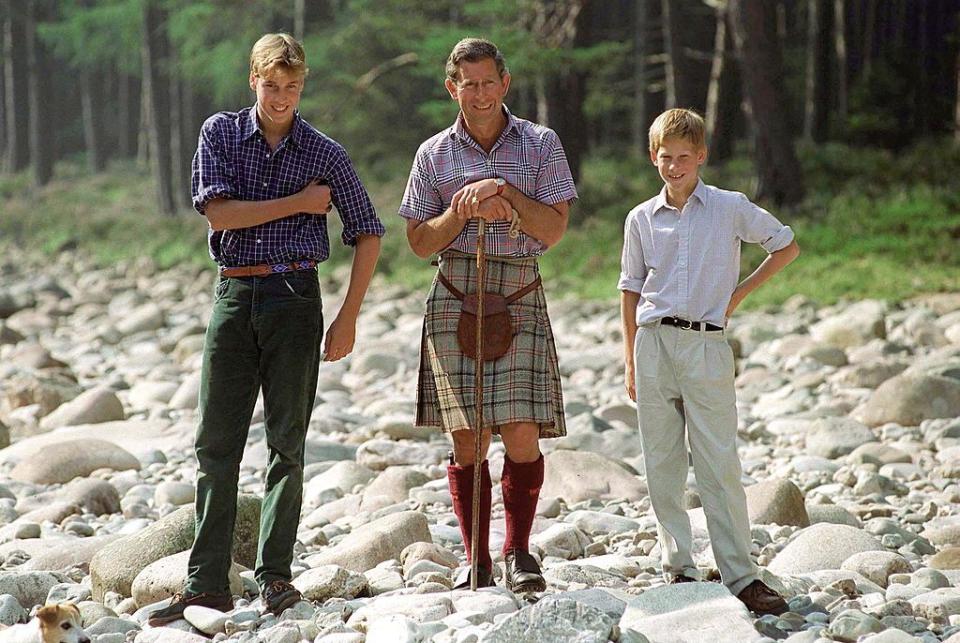 <p>Charles with Prince William and Prince Harry at Polvier, by the River Dee, Balmoral Castle Estate.</p>