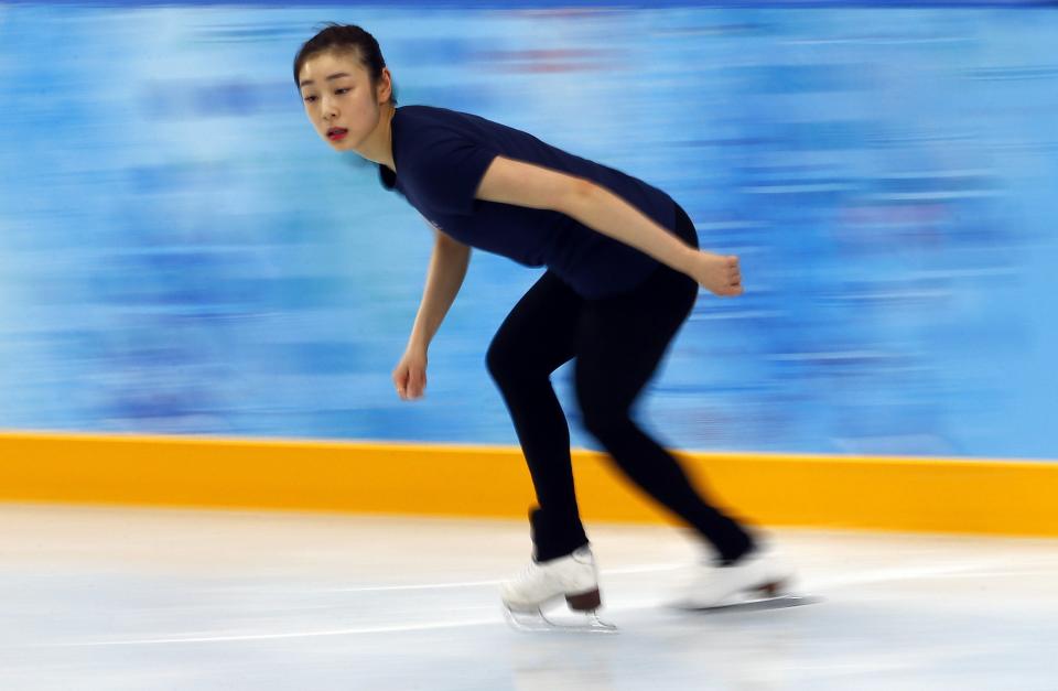 South Korea's Kim Yuna practices her routine during a figure skating training session at the Iceberg Skating Palace training arena during the 2014 Sochi Winter Olympics February 17, 2014. REUTERS/David Gray (RUSSIA - Tags: SPORT OLYMPICS SPEED SKATING)