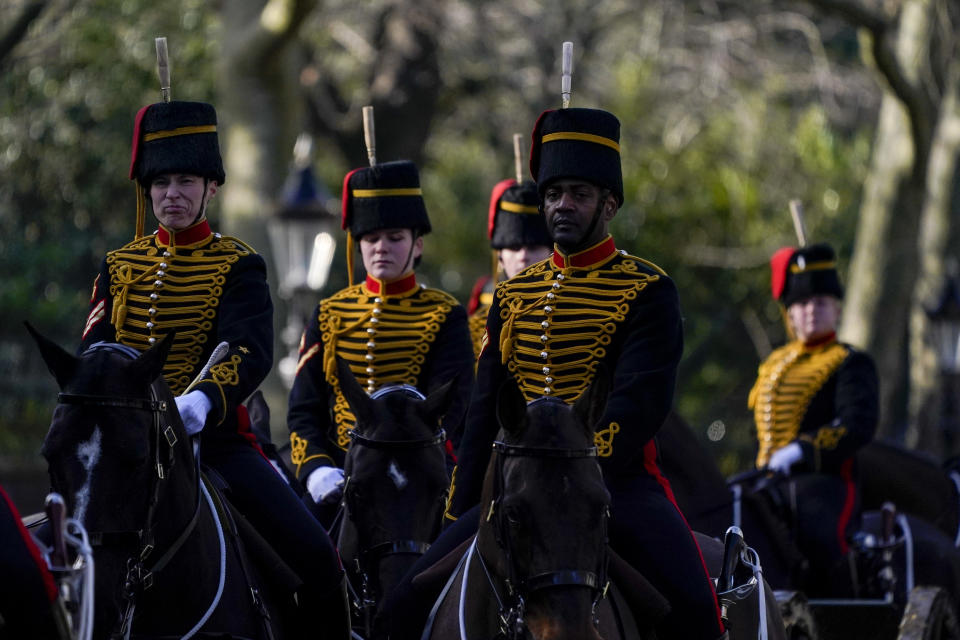 The King's Troop Royal Horse Artillery leave Green Park after fire gun salutes to mark the 70th anniversary of the accession to the throne of Britain's Queen Elizabeth, London, Monday, Feb. 7, 2022. Queen Elizabeth II acceded to the throne on the death of her father King George VI on Feb. 6, 1952.(AP Photo/Alberto Pezzali)