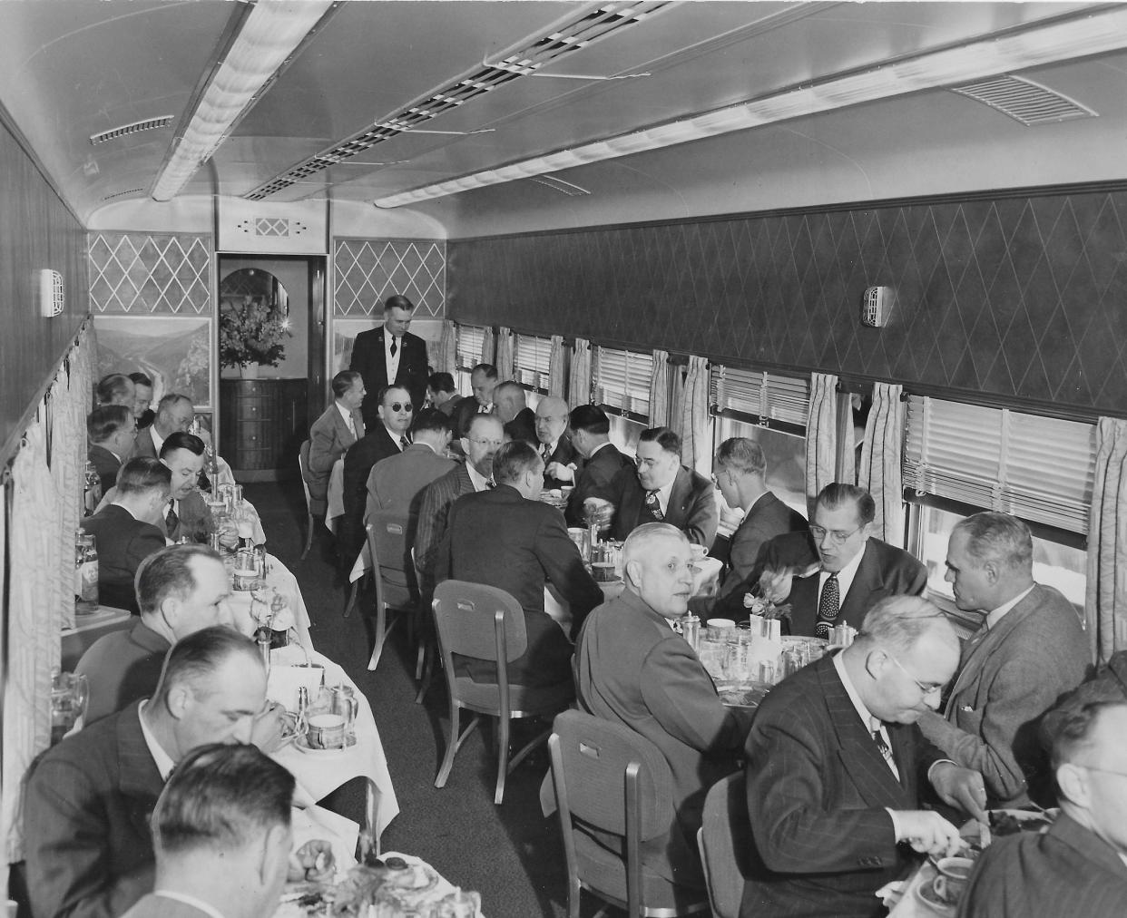 Akron business leaders enjoy breakfast aboard the Baltimore & Ohio Railroad’s New Columbian Strata-Dome streamliner May 11, 1949.