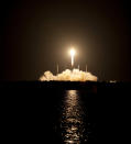 SpaceX's unmanned Dragon capsule rises into the Florida sky on the night of Oct. 7, 2012.