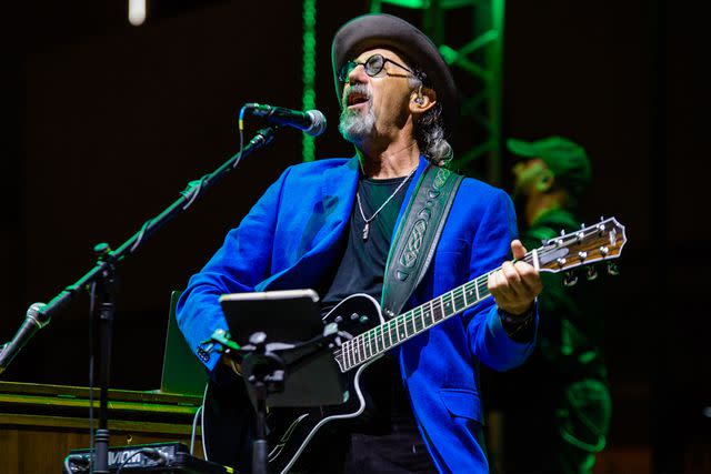 Davide Pischettola/NurPhoto via Getty Images Jack Sonni performing on stage with Dire Straits Legacy