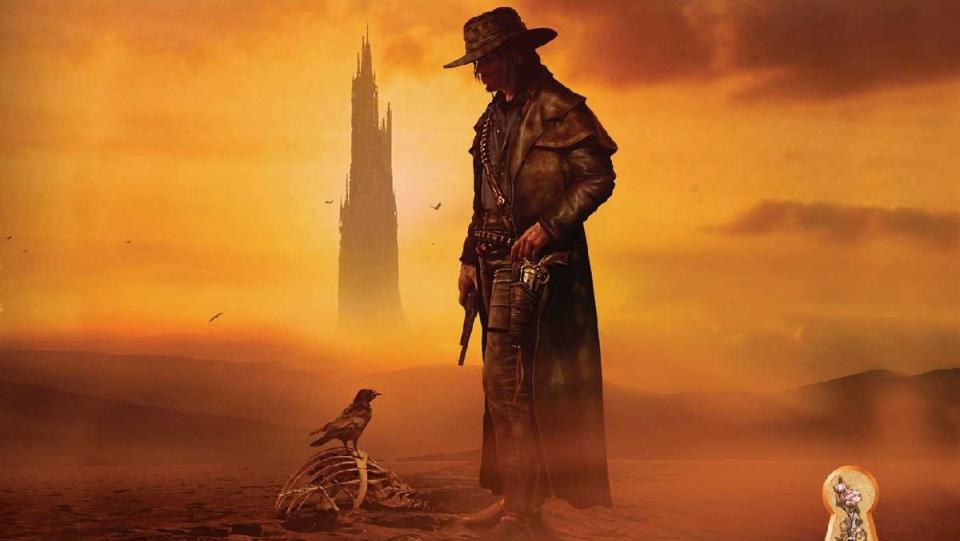 The cover of The Dark Tower book featuring Roland the Gunslinger standing over a desiccated corpse with the eponymous Dark Tower in the background.