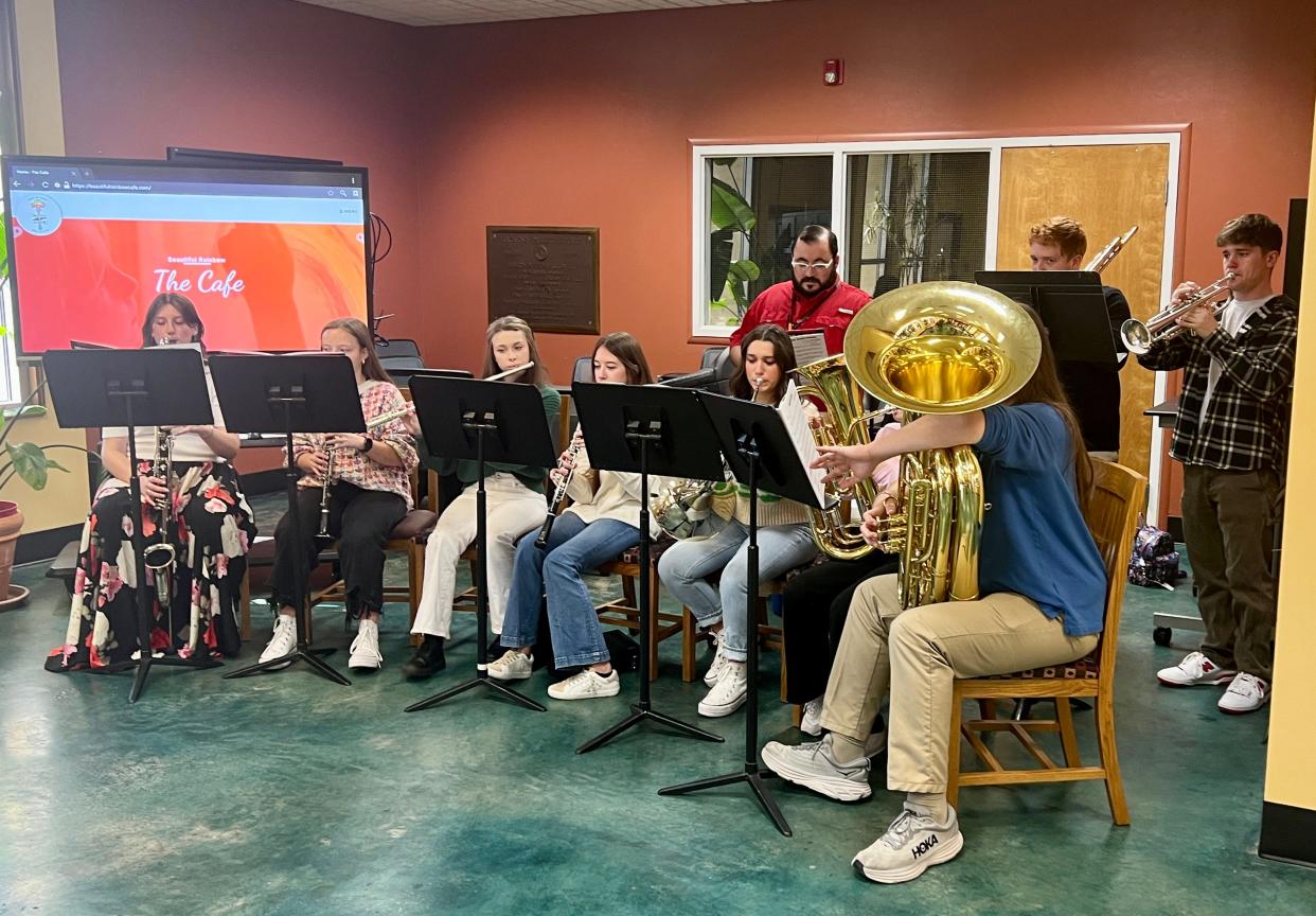 Members of Gadsden City High School's symphonic band provided musical entertainment at Beautiful Rainbow Cafe's seventh anniversary celebration.