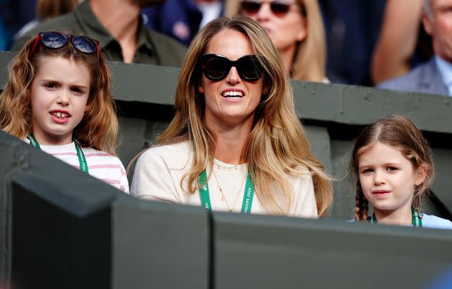 <p>Mike Egerton/PA Images/Getty</p> Kim Murray and kids on day four of the 2024 Wimbledon Championships on July 4, 2024.