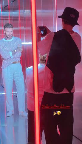 <p>Cruz Beckham/Instagram</p> David Beckham posing while Cruz Beckham takes his picture