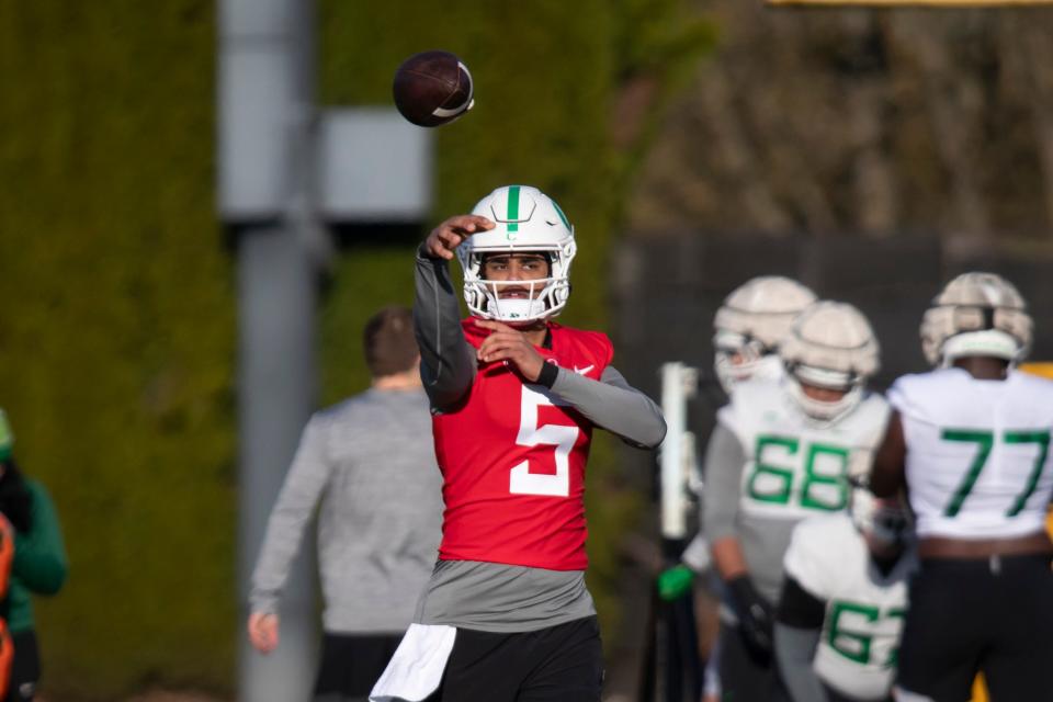 Oregon quarterback Dante Moore practices with the Ducks during Oregon Ducks spring camp, Thursday, March 14, 2024.