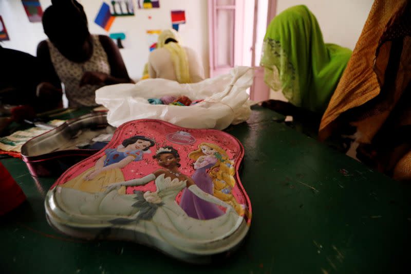 Women attend a sewing workshop at La Maison Rose, a shelter for women and girls who have fled abuse, rape, forced marriage and other trauma in Dakar