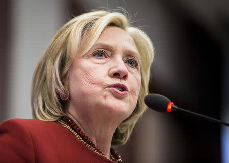 Former U.S. Secretary of State Hillary Clinton delivers remarks during the 2015 Toner Prize for Excellence in Political Reporting award in Washington March 23, 2015. REUTERS/Joshua Roberts