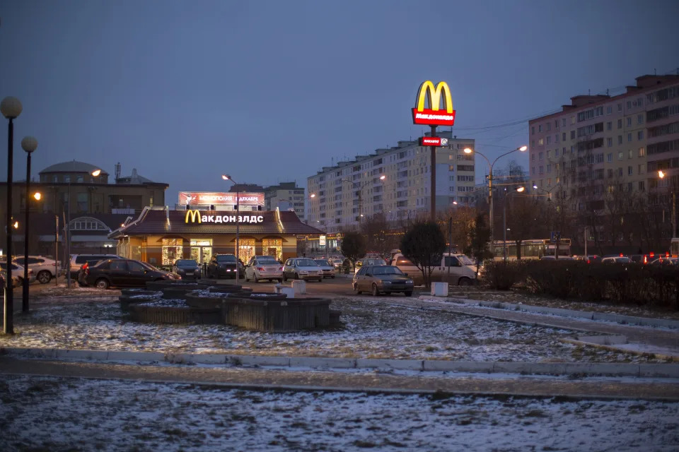 FILE - McDonald's restaurant is seen in the center of Dmitrov, a Russian town 75 km., (47 miles) north from Moscow, Russia, on Dec. 6, 2014. McDonald’s says it's started the process of selling its Russian business, which includes 850 restaurants that employ 62,000 people. The fast food giant pointed to the humanitarian crisis caused by the war, saying holding on to its business in Russia “is no longer tenable, nor is it consistent with McDonald’s values.” The Chicago-based company had temporarily closed its stores in Russia but was still paying employees. (AP Photo/FILE)