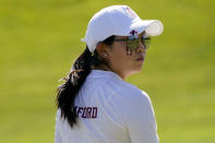 Stanford golfer Rose Zhang looks away after her putt on the eighth green during the NCAA college women's golf championship semifinal at Grayhawk Golf Club, Tuesday, May 24, 2022, in Scottsdale, Ariz. (AP Photo/Matt York)