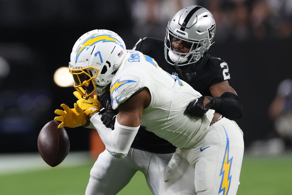 LAS VEGAS, NEVADA – DECEMBER 14: Cornerback Amik Robertson #21 of the Las Vegas Raiders breaks up a pass intended for tight end <a class="link " href="https://sports.yahoo.com/nfl/players/30157" data-i13n="sec:content-canvas;subsec:anchor_text;elm:context_link" data-ylk="slk:Gerald Everett;sec:content-canvas;subsec:anchor_text;elm:context_link;itc:0">Gerald Everett</a> #7 of the Los Angeles Chargers during the second quarter at Allegiant Stadium on December 14, 2023 in Las Vegas, Nevada. (Photo by Sean M. Haffey/Getty Images)