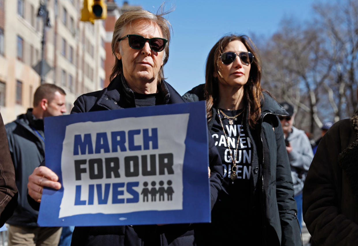 Paul McCartney and his wife, Nancy Shevell, march in New York City on March 24, 2018. (Photo: Shannon Stapleton/Reuters)