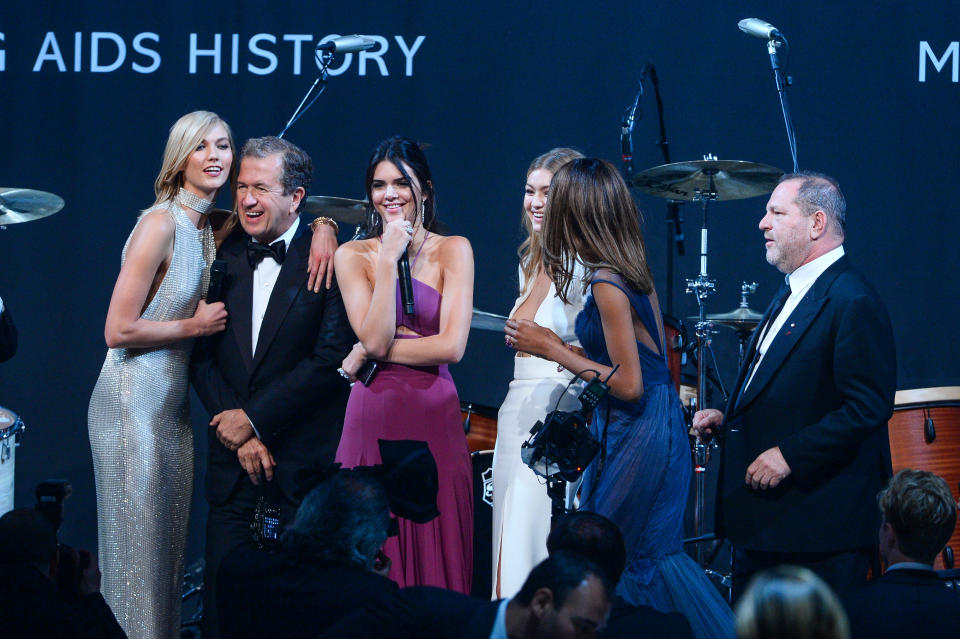 Karlie Kloss, Mario Testino, Kendall Jenner, Gigi Hadid, Jordan Dunn and Harvey Weinstein onstage during amfAR's 22nd Cinema Against AIDS Gala, Presented By Bold Films And Harry Winston at Hotel du Cap-Eden-Roc (Photo by Stephane Cardinale/Corbis via Getty Images)