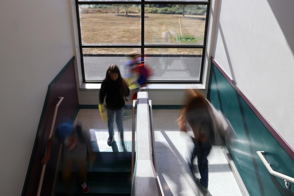 Sixth-grade students make their way to their second period during the first day of school at Leslie Middle School in Salem, Ore. on Tuesday, Sept. 6, 2022.