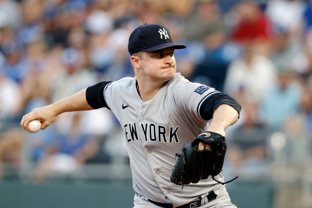 New York Yankees pitcher Clarke Schmidt delivers to a Kansas City Royals batter during the first inning of a baseball game in Kansas City, Mo., Saturday, Sept. 30, 2023. (AP Photo/Colin E. Braley)