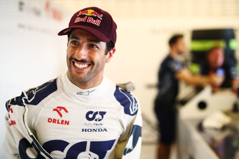 Daniel Ricciardo of Australia and Scuderia AlphaTauri prepares to drive in the garage during Formula 1 testing at Yas Marina Circuit on November 28, 2023 in Abu Dhabi, United Arab Emirates