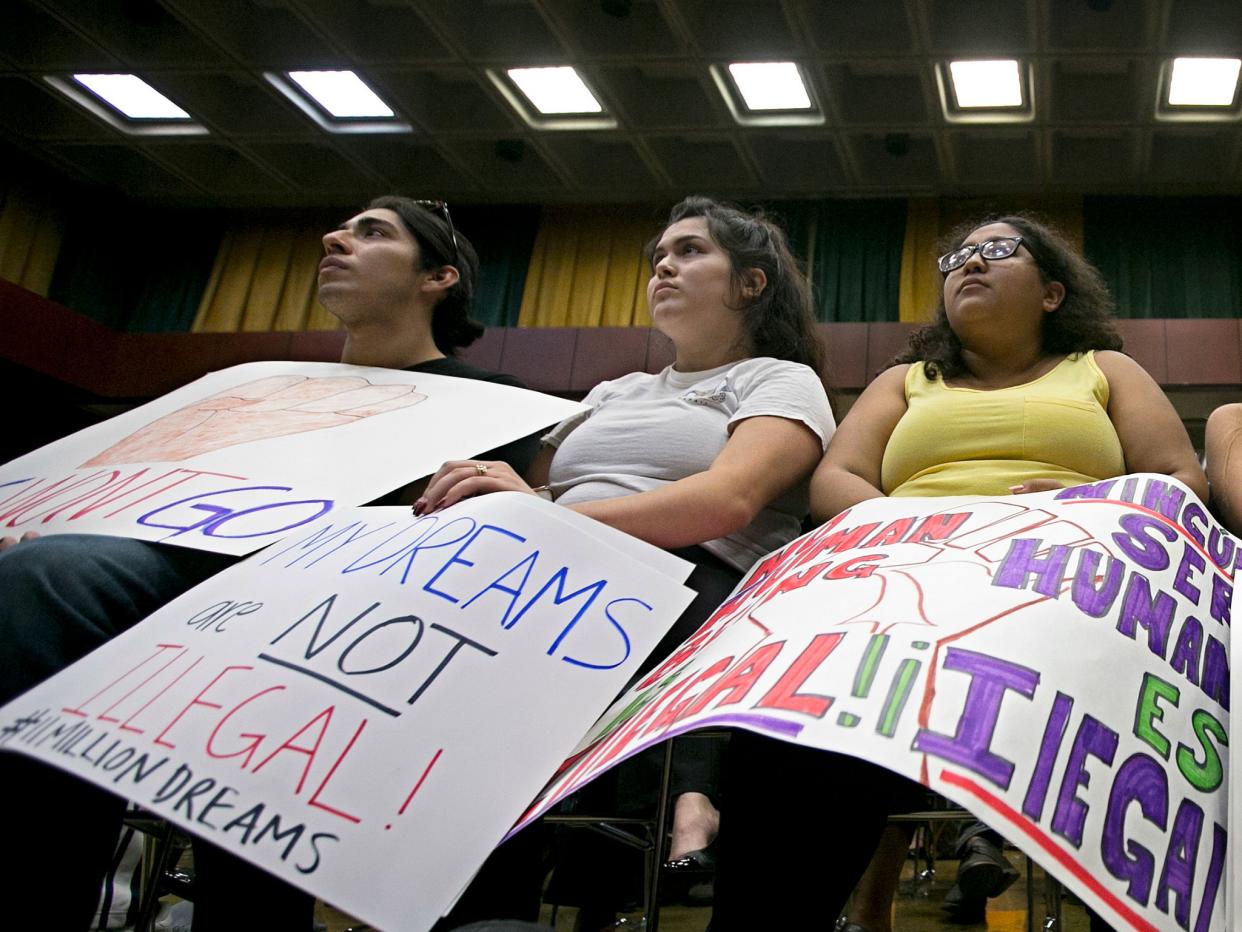 Students listen to Nancy Pelosi speak at California State University: AP